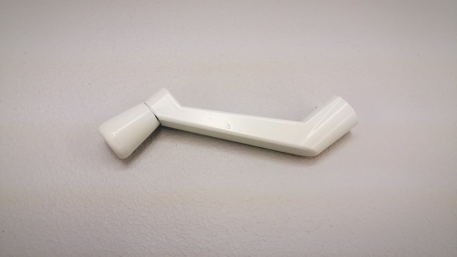 Poignée fixe blanche pour opérateur de fenêtre à battant - Image 1
